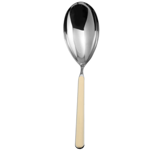 Silver spoon with a beige handle on a white background