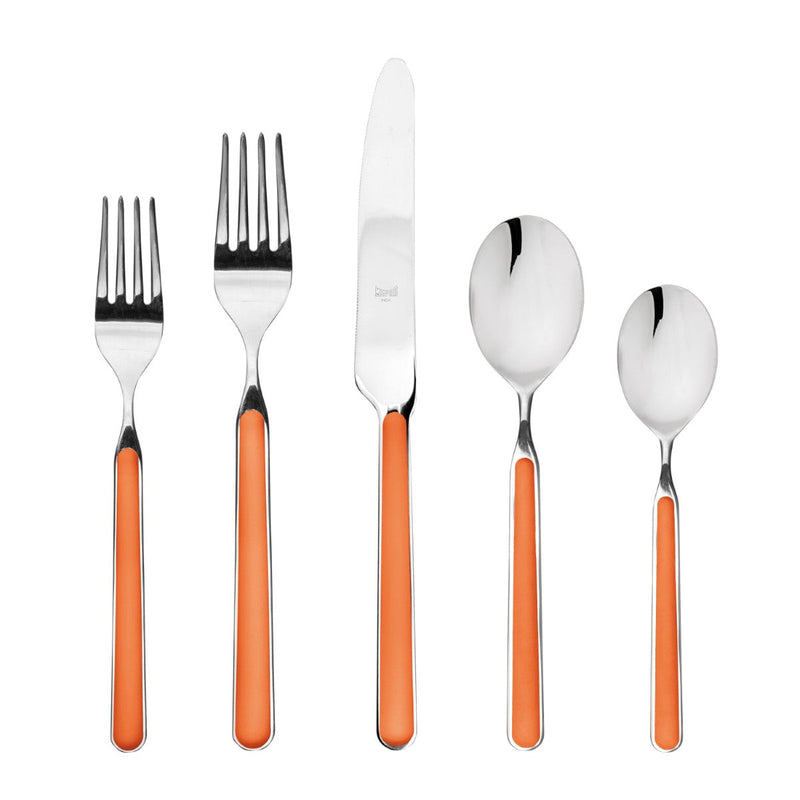 Set of silver cutlery with orange handles on a white background