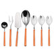 Set of silver cutlery with orange handles on a white background