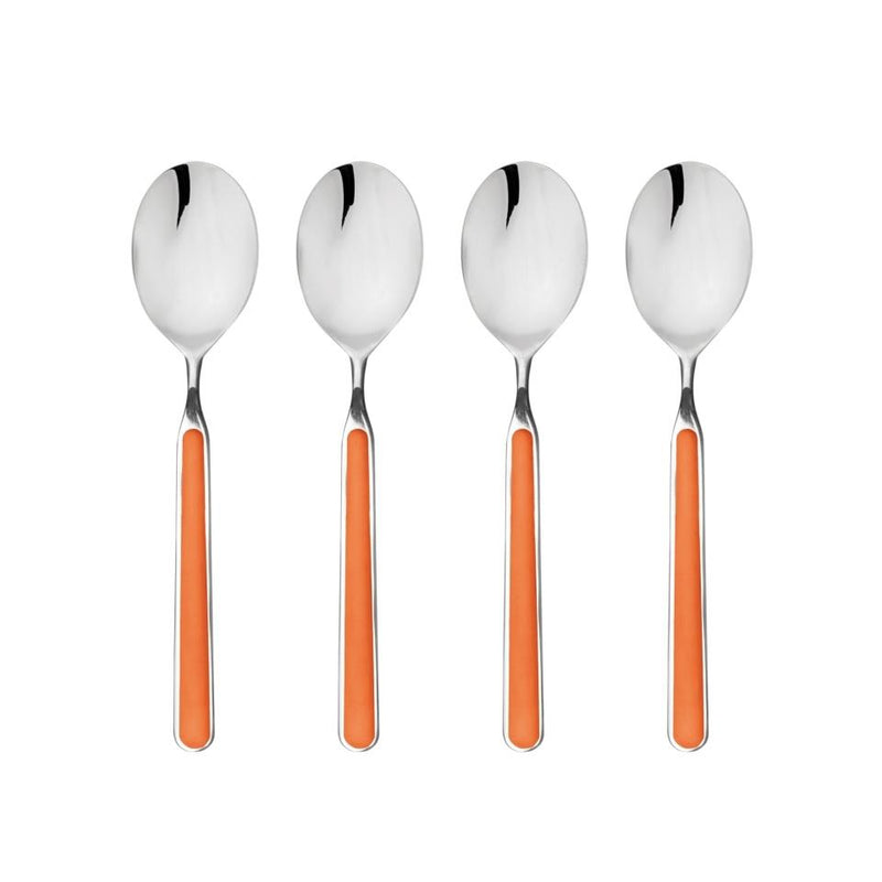 Four silver spoons with orange handles on a white background