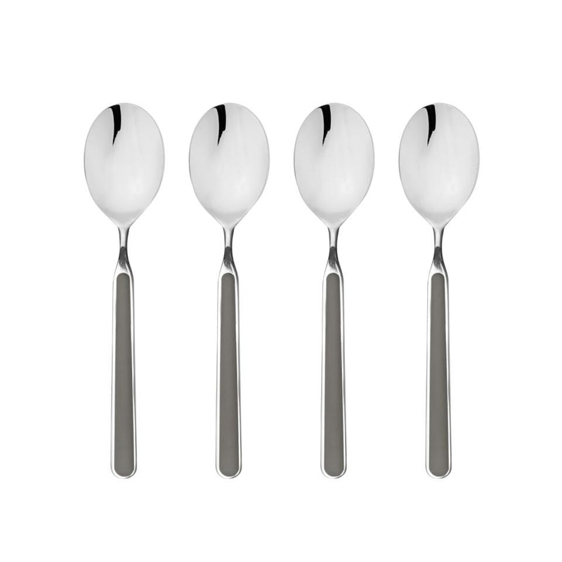 Four silver spoons on a white background