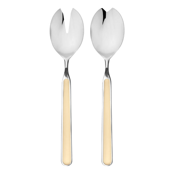 Two silver salad servers with beige handles on a white background