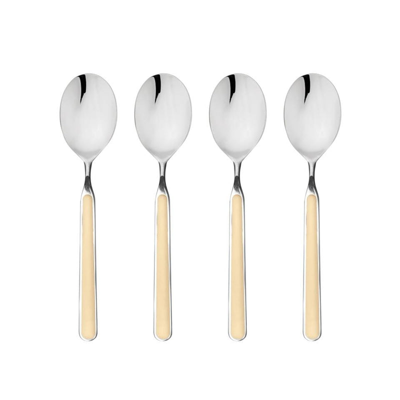 Four silver spoons with beige handles on a white background