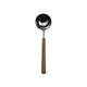 Spoon with brown handle on a white background