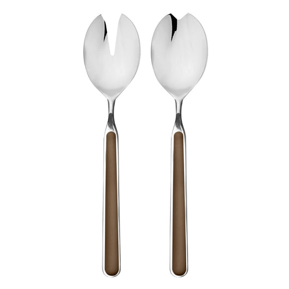 Two silver salad servers with brown handles on a white background