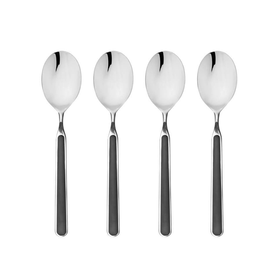 Four silver spoons on a white background