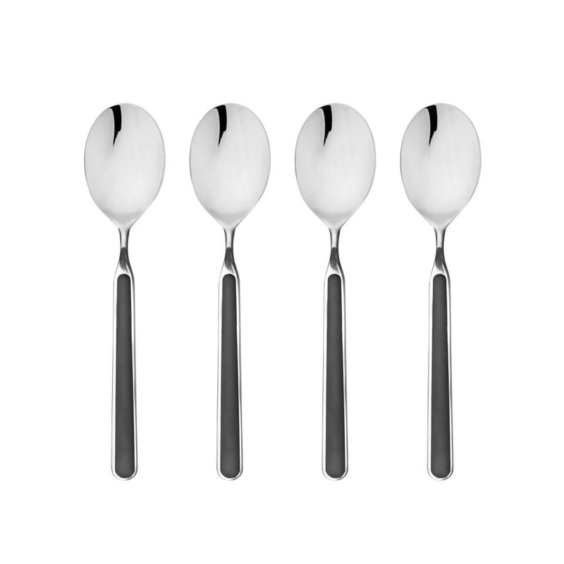 Four silver spoons on a white background