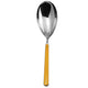 Spoon with a yellow handle on a white background
