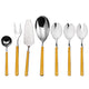 Set of silver cutlery with yellow handles on a white background