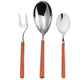Set of silver cutlery with orange handles on a white background
