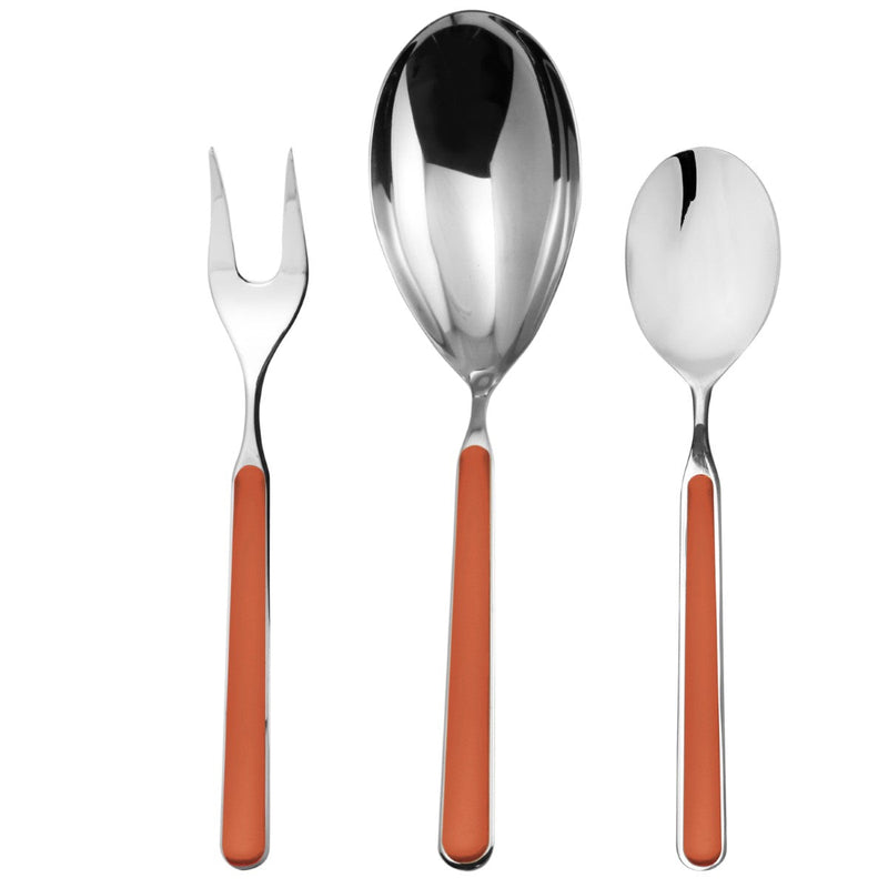 Set of silver cutlery with orange handles on a white background