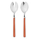 Two silver salad servers with orange handles on a white background