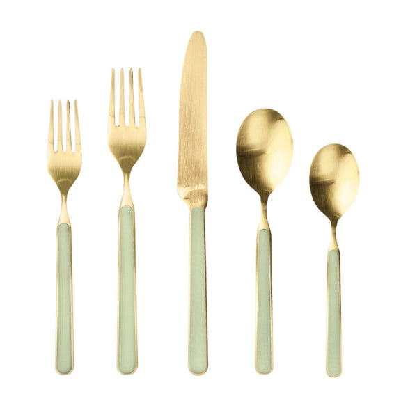 Set of gold cutlery with green handles on a white background