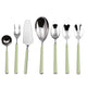 Set of silver cutlery with green handles on a white background
