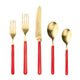 Set of gold cutlery with red handles on a white background