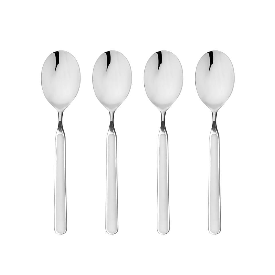 Set of four silver spoons on a white background