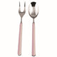 Spoon and fork with pink handles on a white background