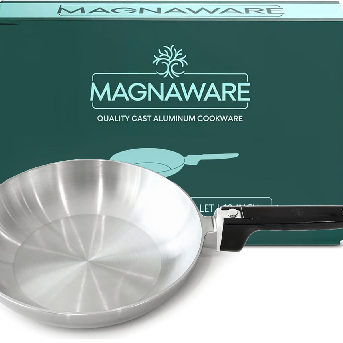 Silver frying pan with black handle in front of a Magnaware box.