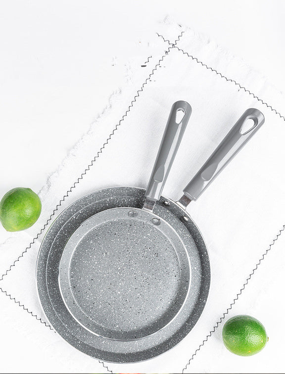 Set of two gray frying pans with handles on a white background