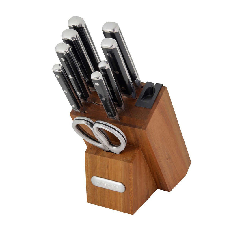 Set of knives with a wooden block on a white background