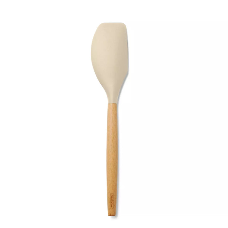 Beige silicone spatula with wooden handle on a white background