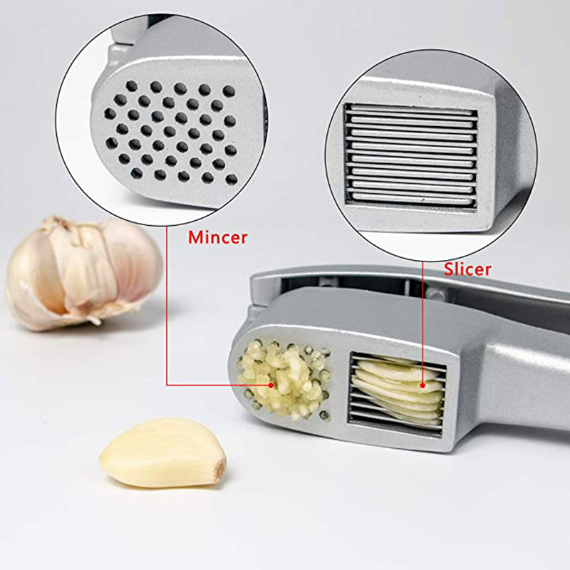Garlic press with mincer and slicer attachments on a white background