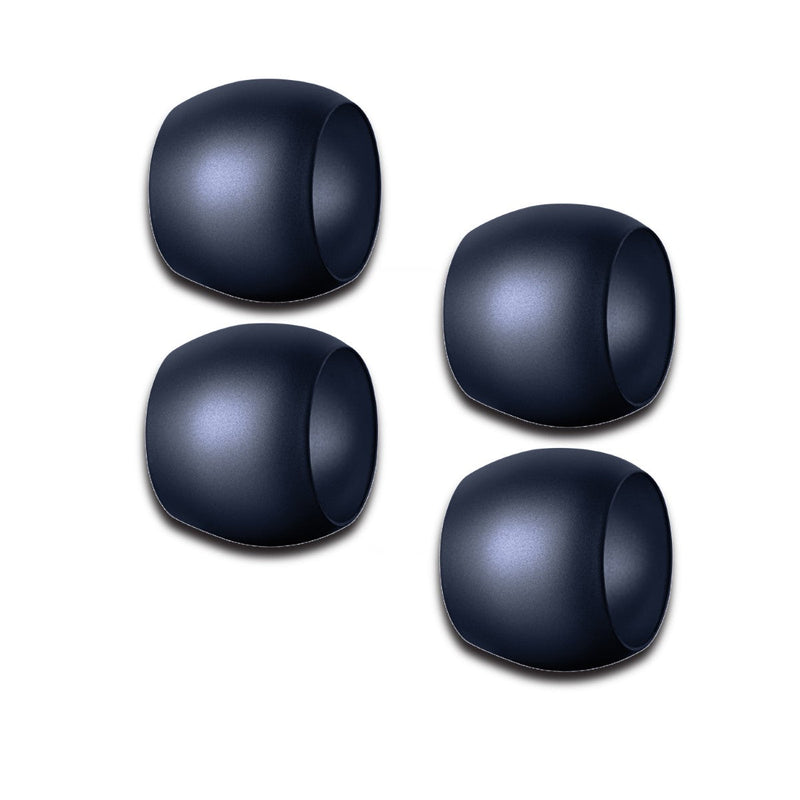 Four dark blue Mepra napkin rings on a white background