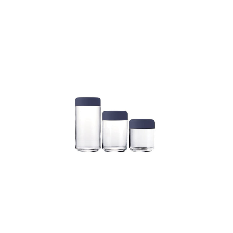 Three glass containers with navy blue lids on a white background