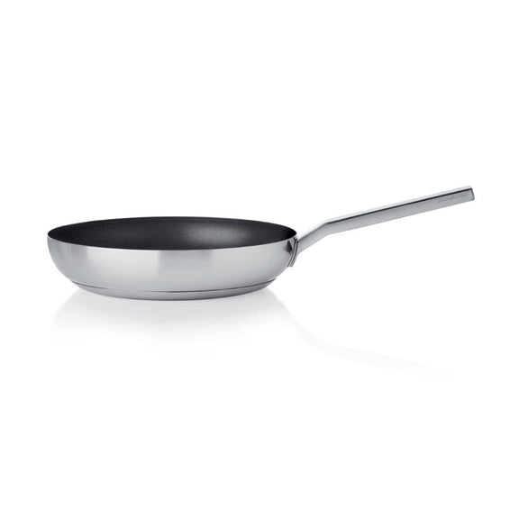 Stainless steel frying pan on a white background