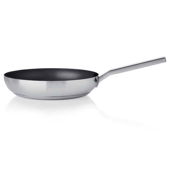 Stainless steel frying pan on a white background