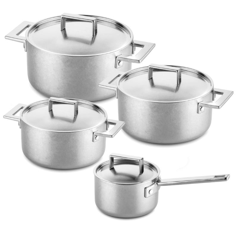 Set of stainless steel cookware with lids on a white background