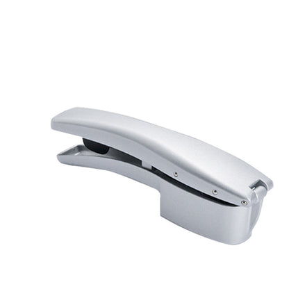 Metallic Garlic Press on a white background