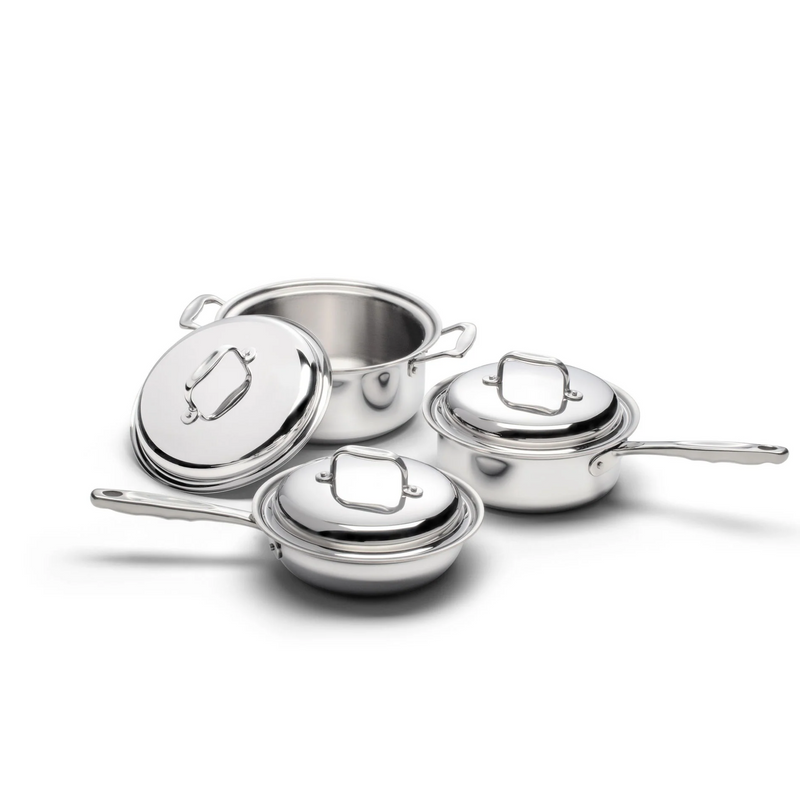 Set of stainless steel cookware with lids on a white background