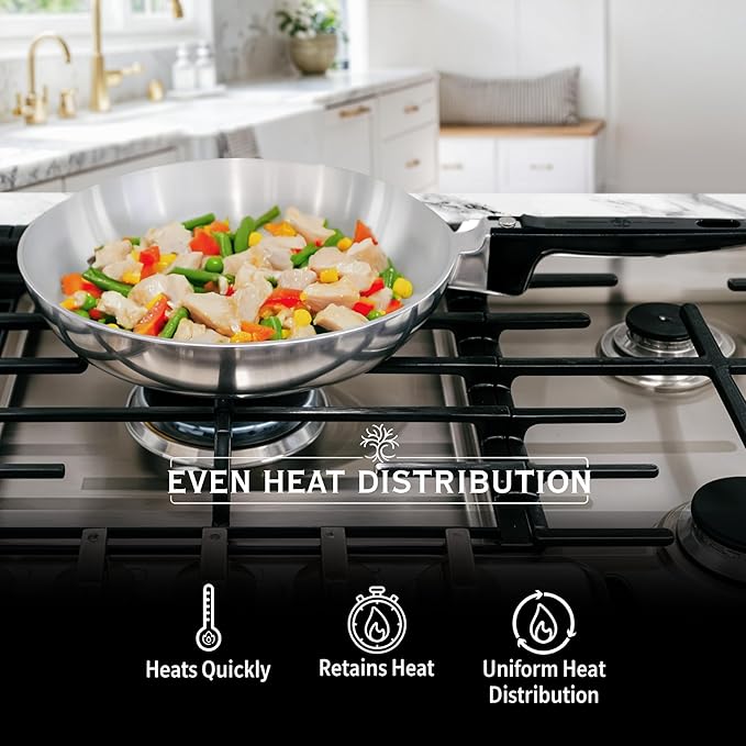 Stainless steel wok with food on a gas stove, emphasizing even heat distribution.
