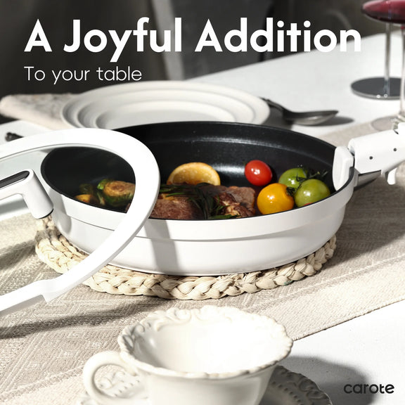 White pan with food on a table setting, featuring the brand 'carote'.