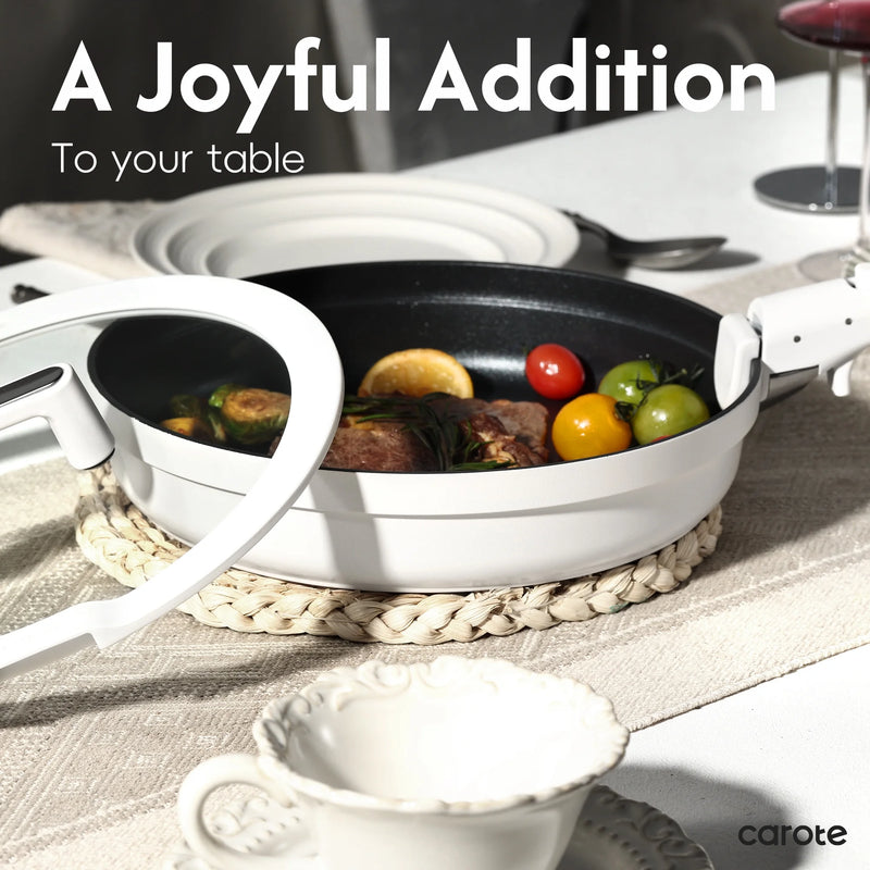 White pan with food on a table setting, featuring the brand 'carote'.