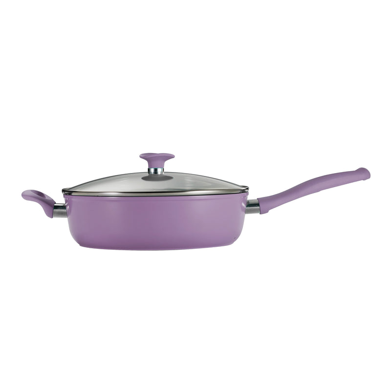 Purple frying pan with a lid on a white background