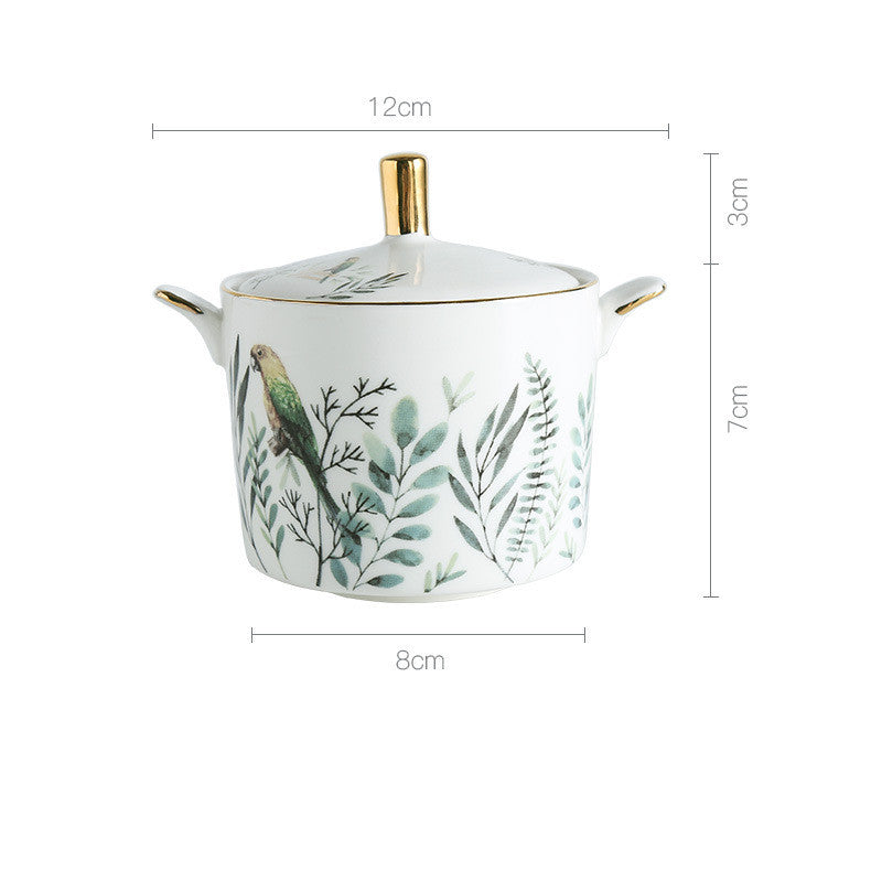 Ceramic pot with botanical design and gold accents, shown with dimensions on a white background.