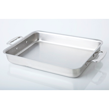 Stainless steel roasting pan on a white background