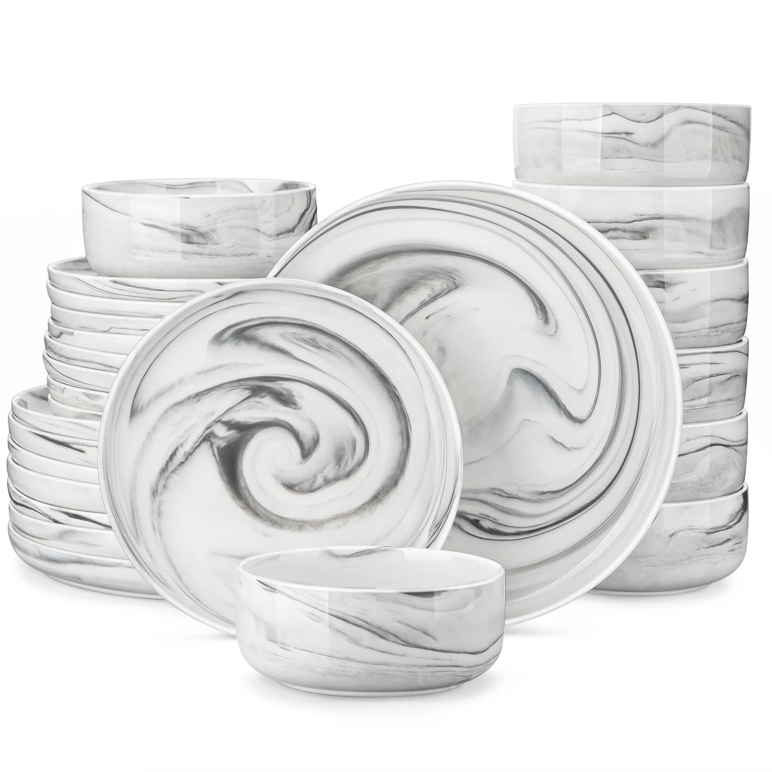 Set of white marble-patterned ceramic dinnerware on a white background