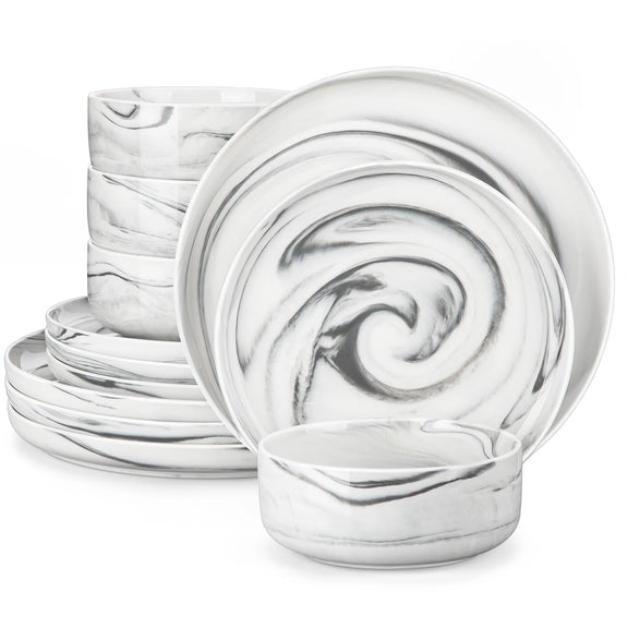 Set of white marble-patterned ceramic plates on a white background