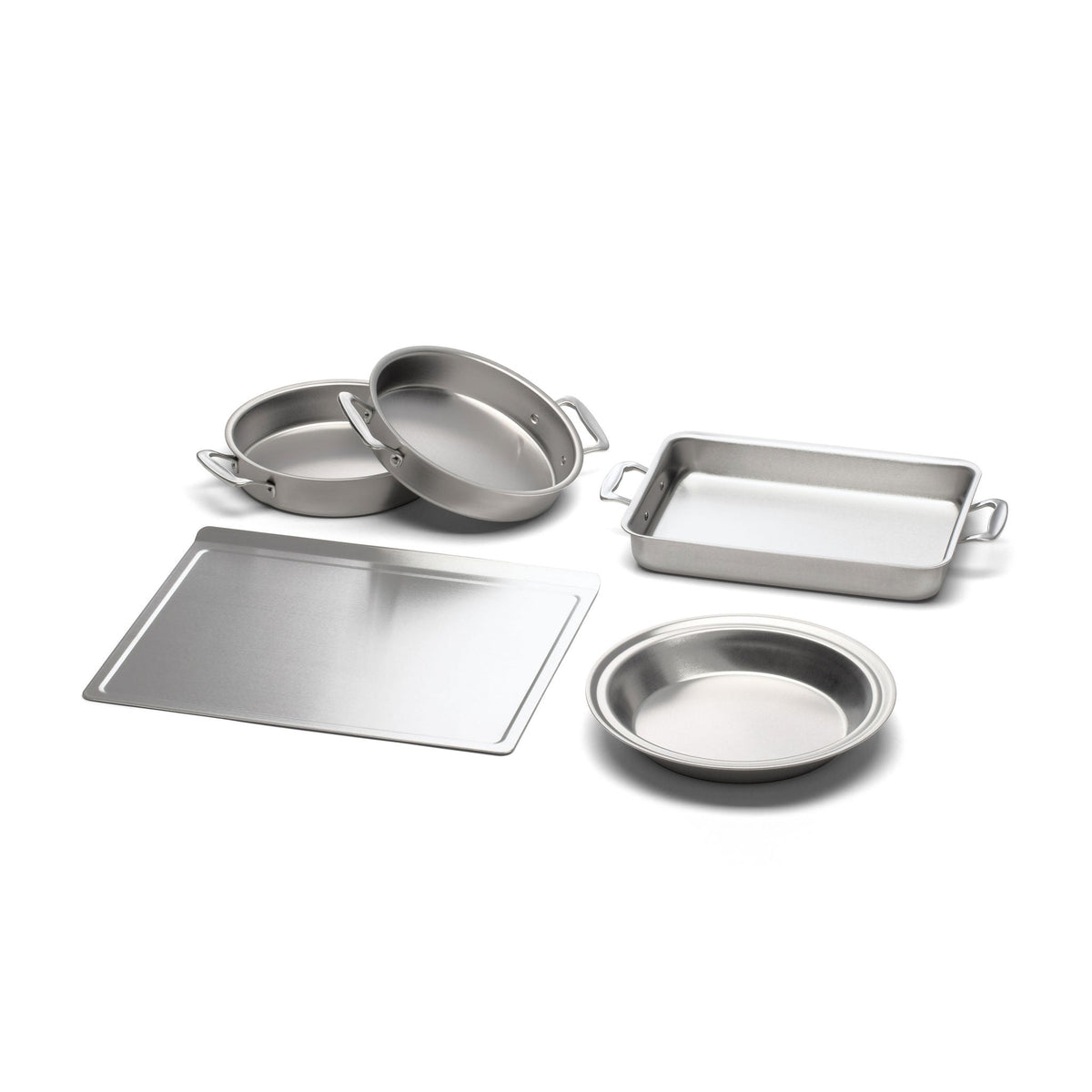Set of stainless steel cookware on a white background