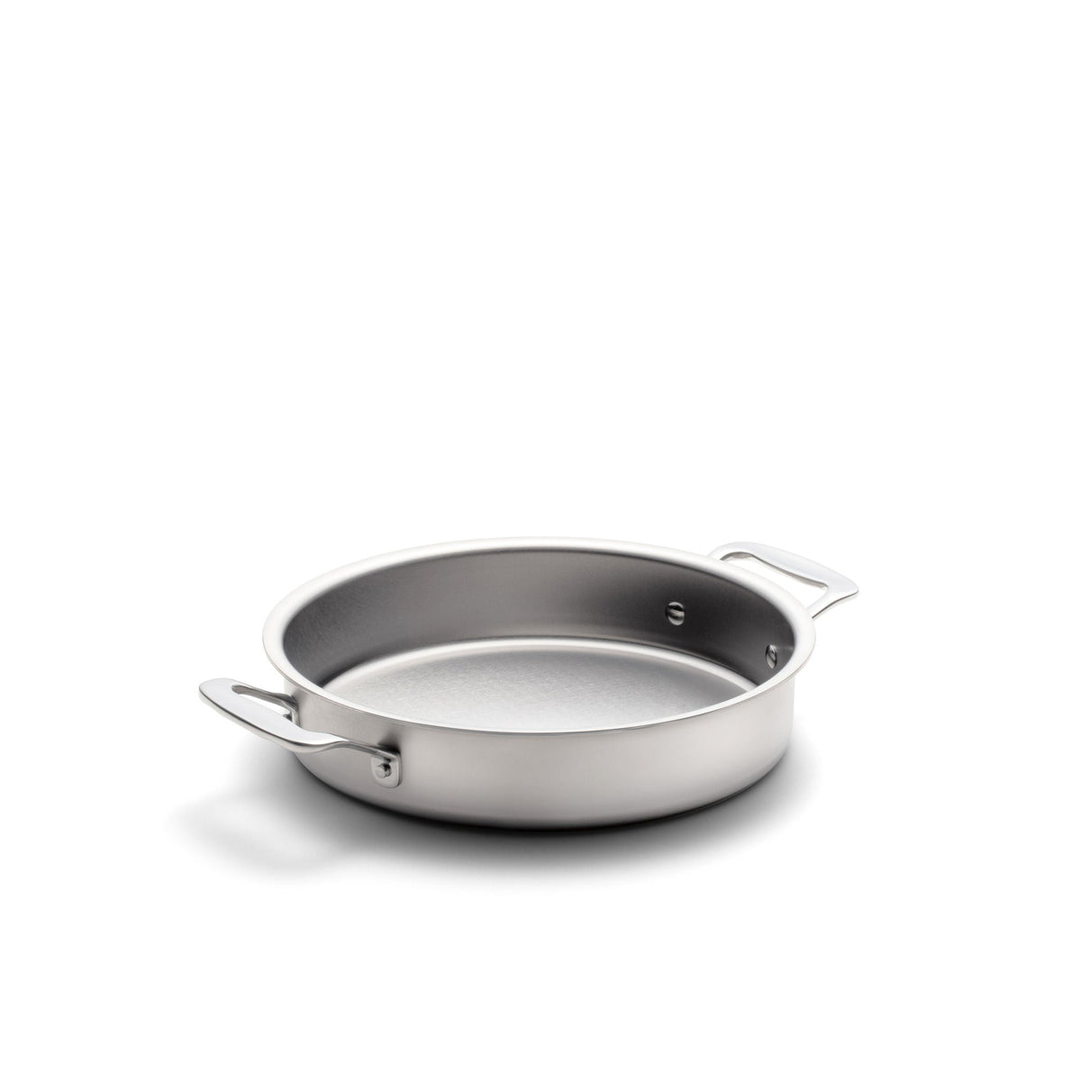 Stainless steel frying pan on a white background