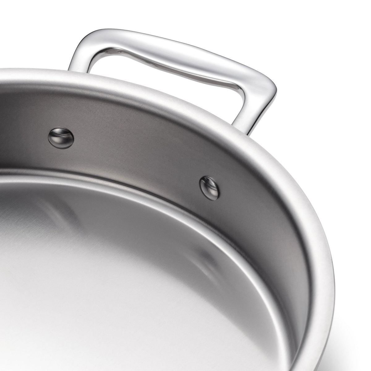 Close-up of a stainless steel pot with a handle on a white background