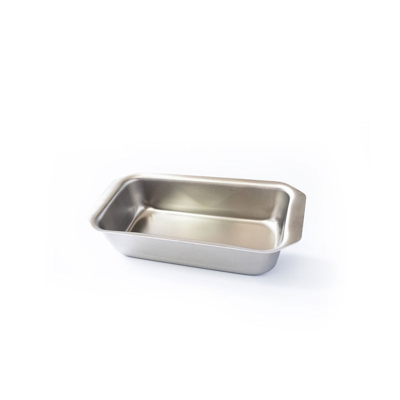 Stainless steel baking pan on a white background