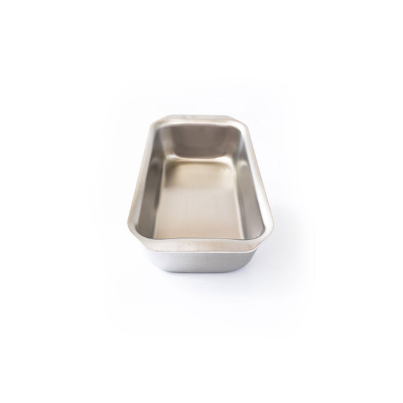 Stainless steel baking dish on a white background
