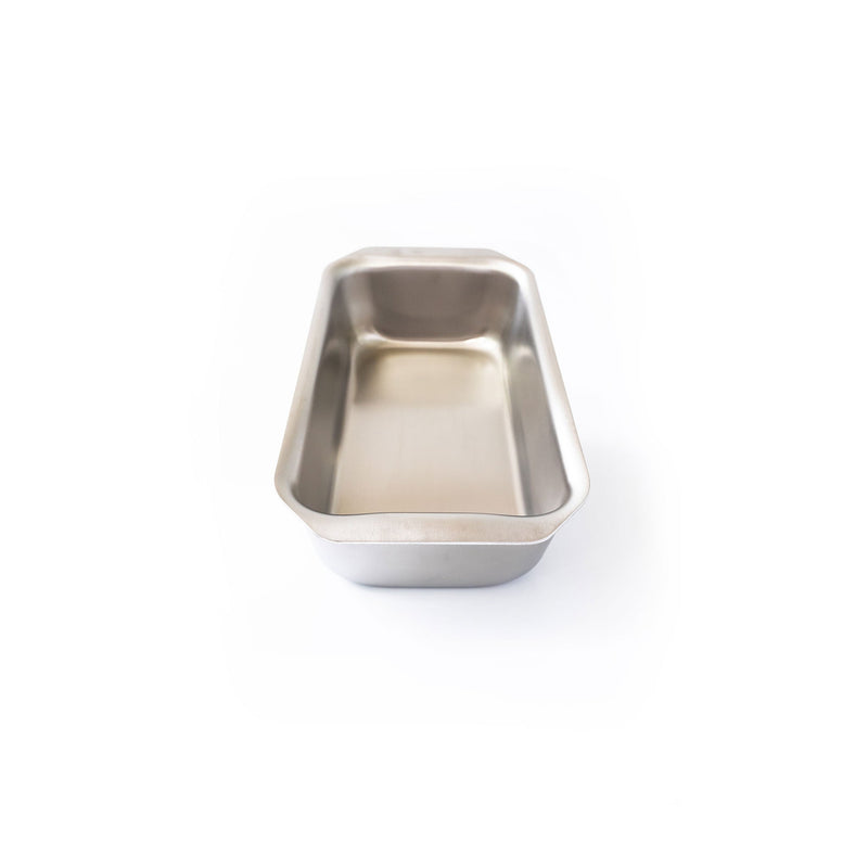 Stainless steel baking dish on a white background
