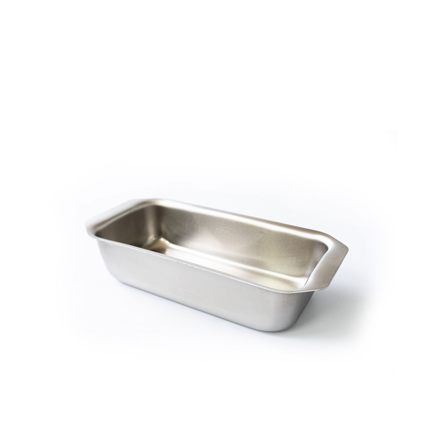 Stainless steel loaf pan on a white background