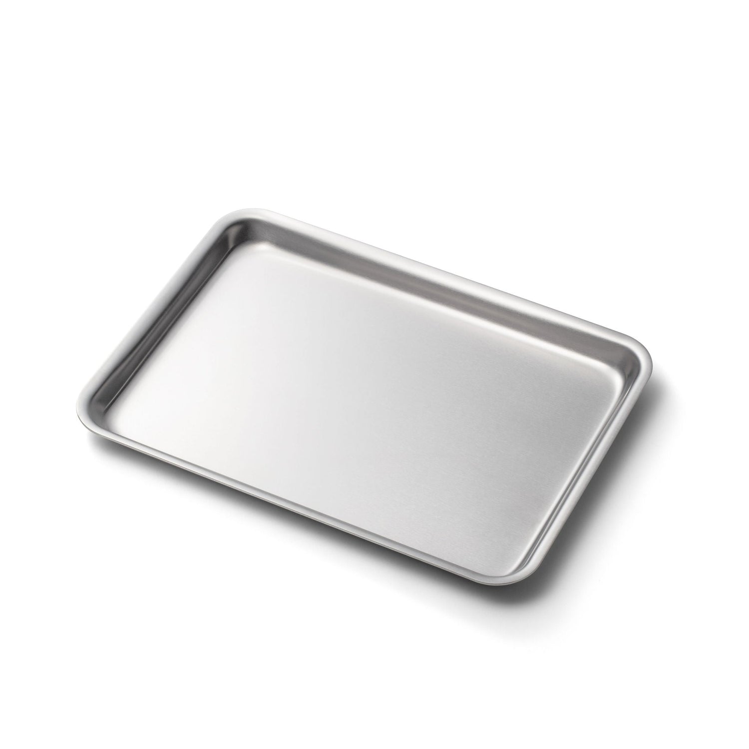 Metal baking tray on a white background