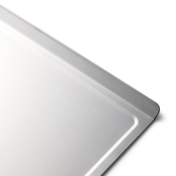Closeup view of Baking sheet on a white background